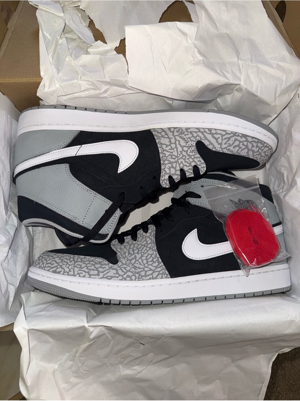 Jordan• 1 Mid SE in Black, University Red-White